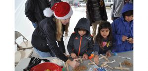 Rainy cheer at annual Christmas on Mercer