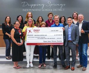 Dripping Springs Education Foundation gives check to Dripping Springs ISD