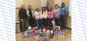 PEC employees donate more than 800 toys to area Santa programs